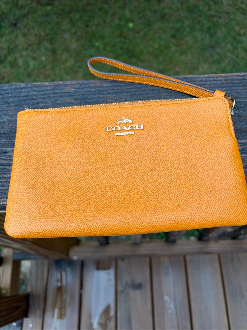 Coach Pebbled Leather Wristlet Clutch in Orange cross grain with gold hardware